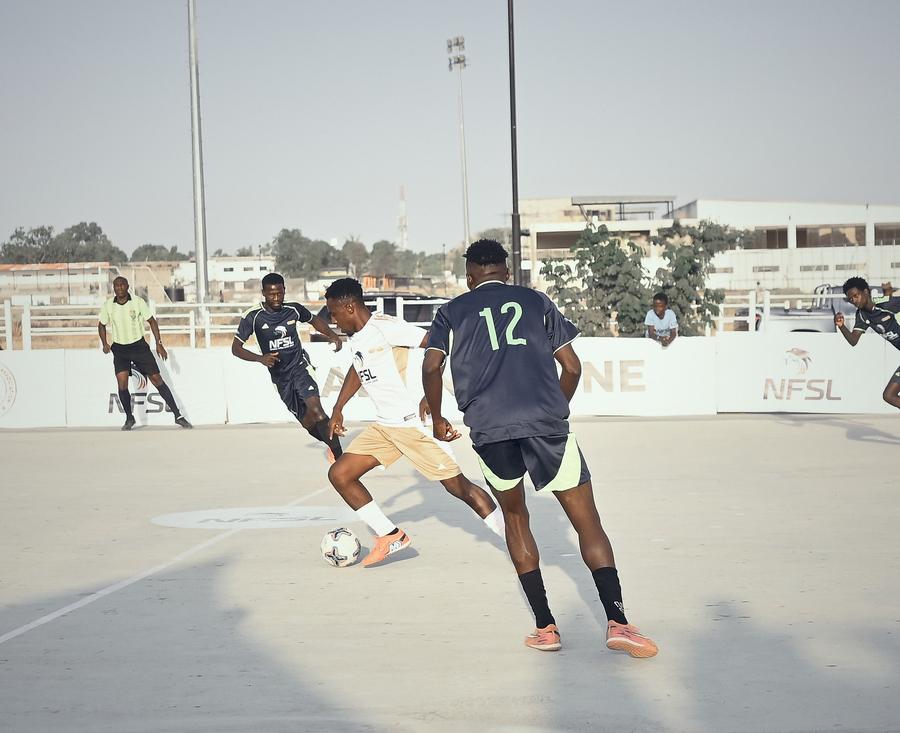 Two players contesting a loose ball